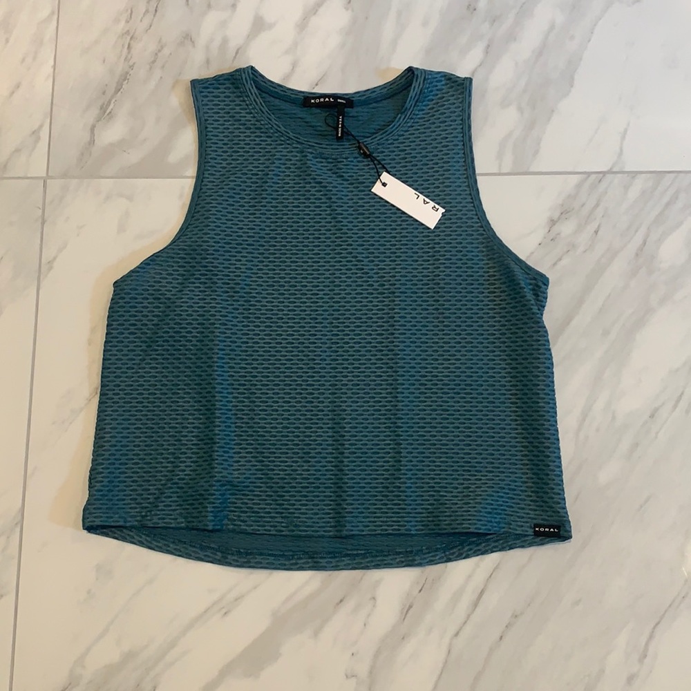 Moral woman’s teal tank size small